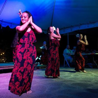 a woman standing in front of a stage