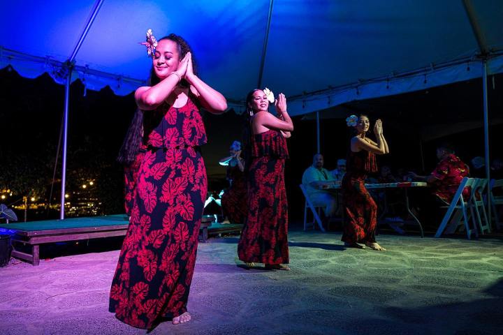 a woman standing in front of a stage