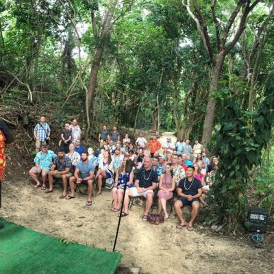 a group of people in a forest