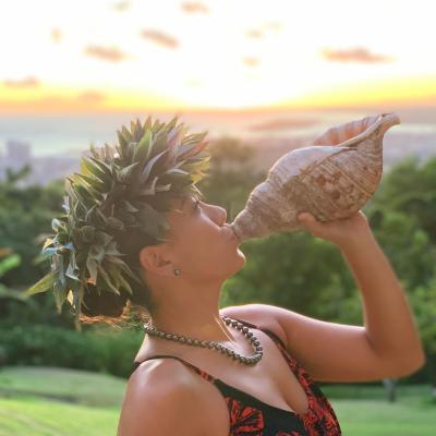 a woman holding a frisbee