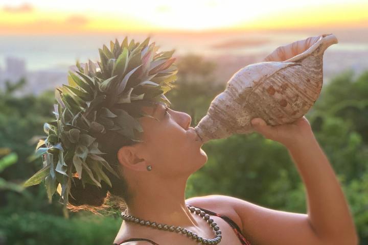 a woman holding a frisbee
