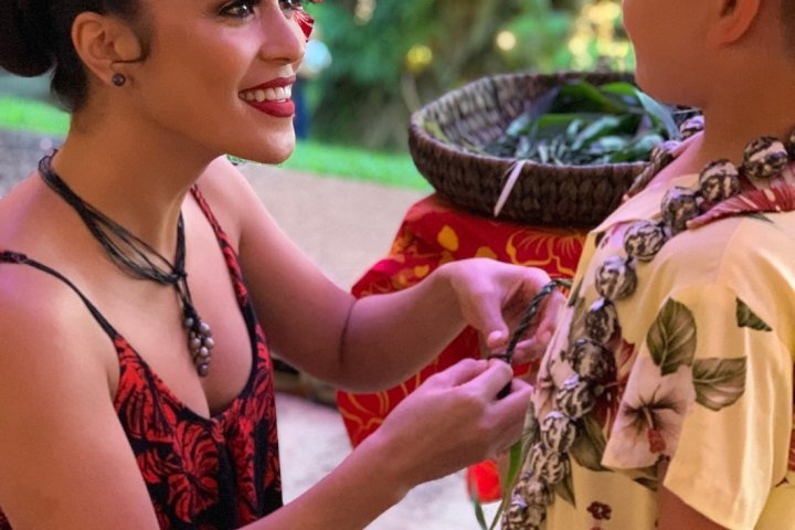 a woman holding a wine glass